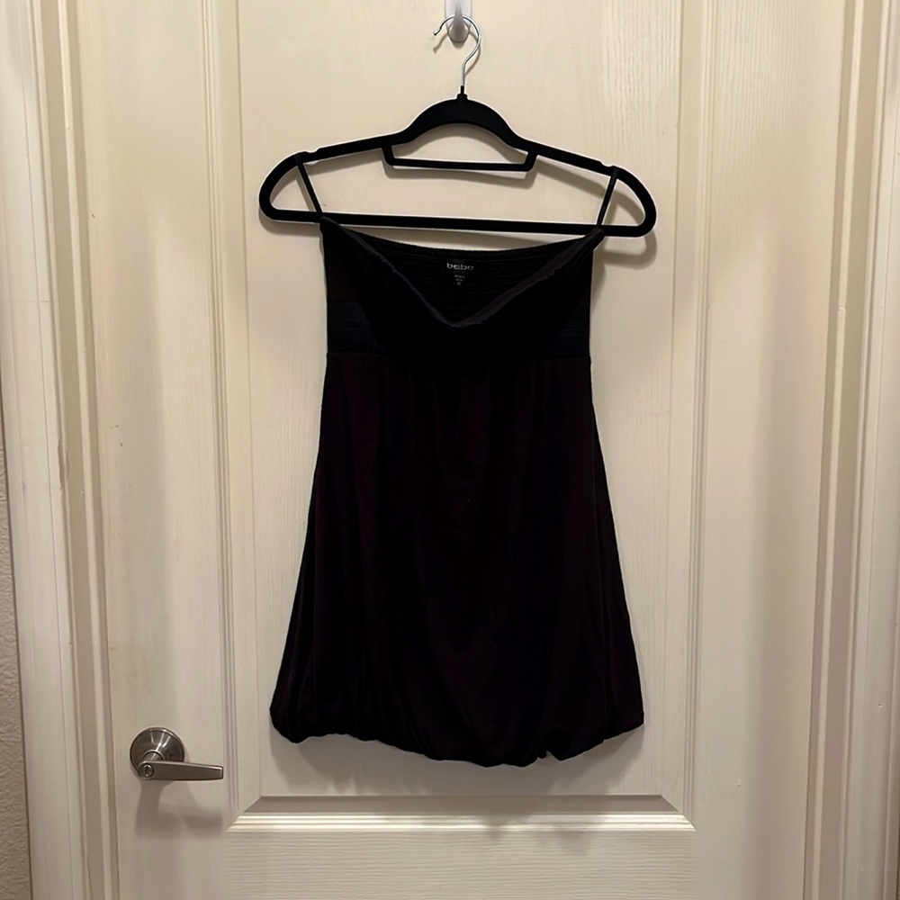 Black BEBE strapless bubble bottom mini dress with silk/satin cross top.